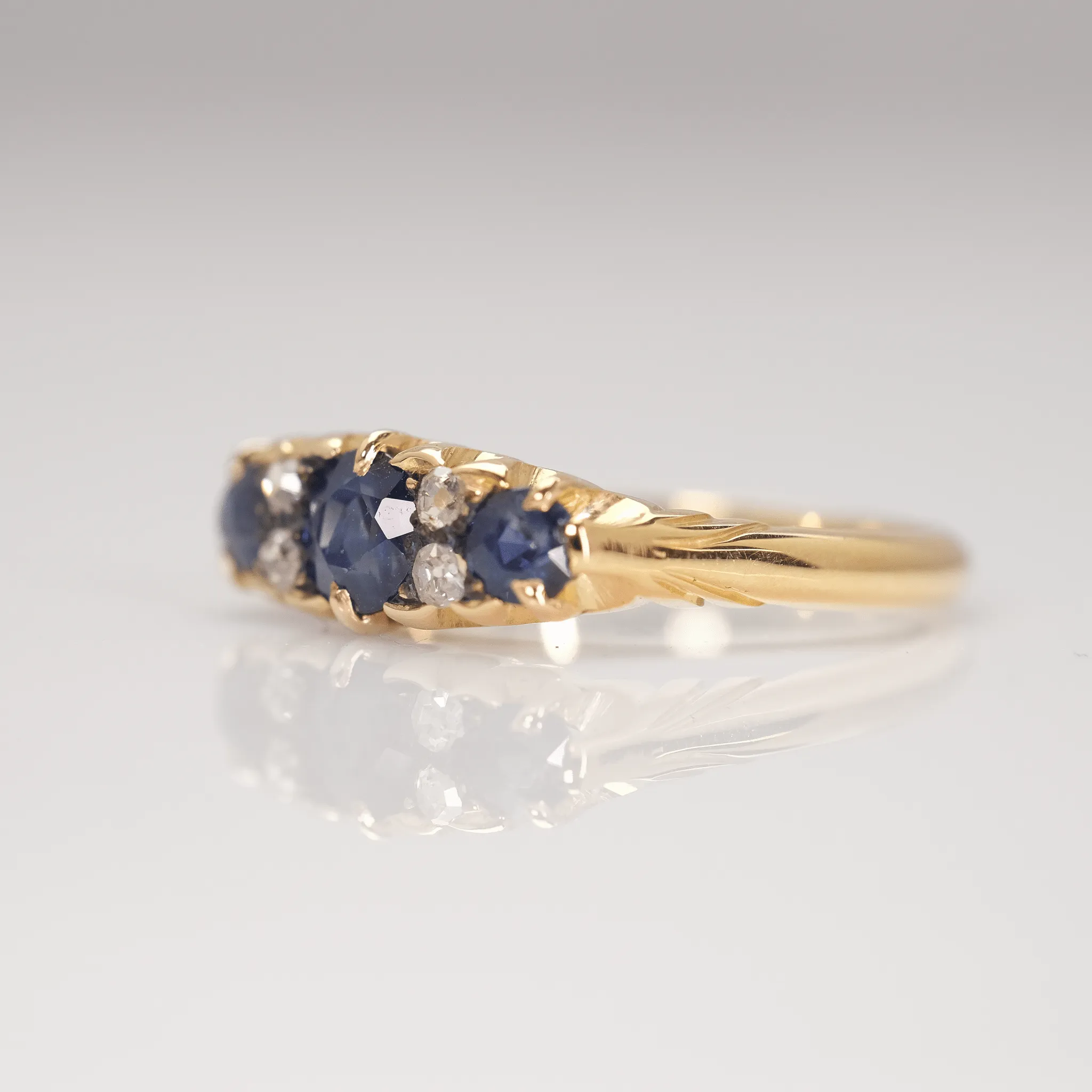 Art Deco Seven Stone Sapphire and Diamond Ring