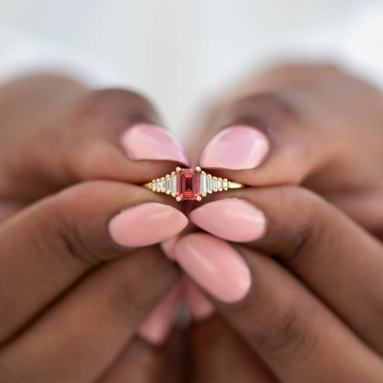 Padparadscha Sapphire Engagement Ring with Baguette Diamond Detailing