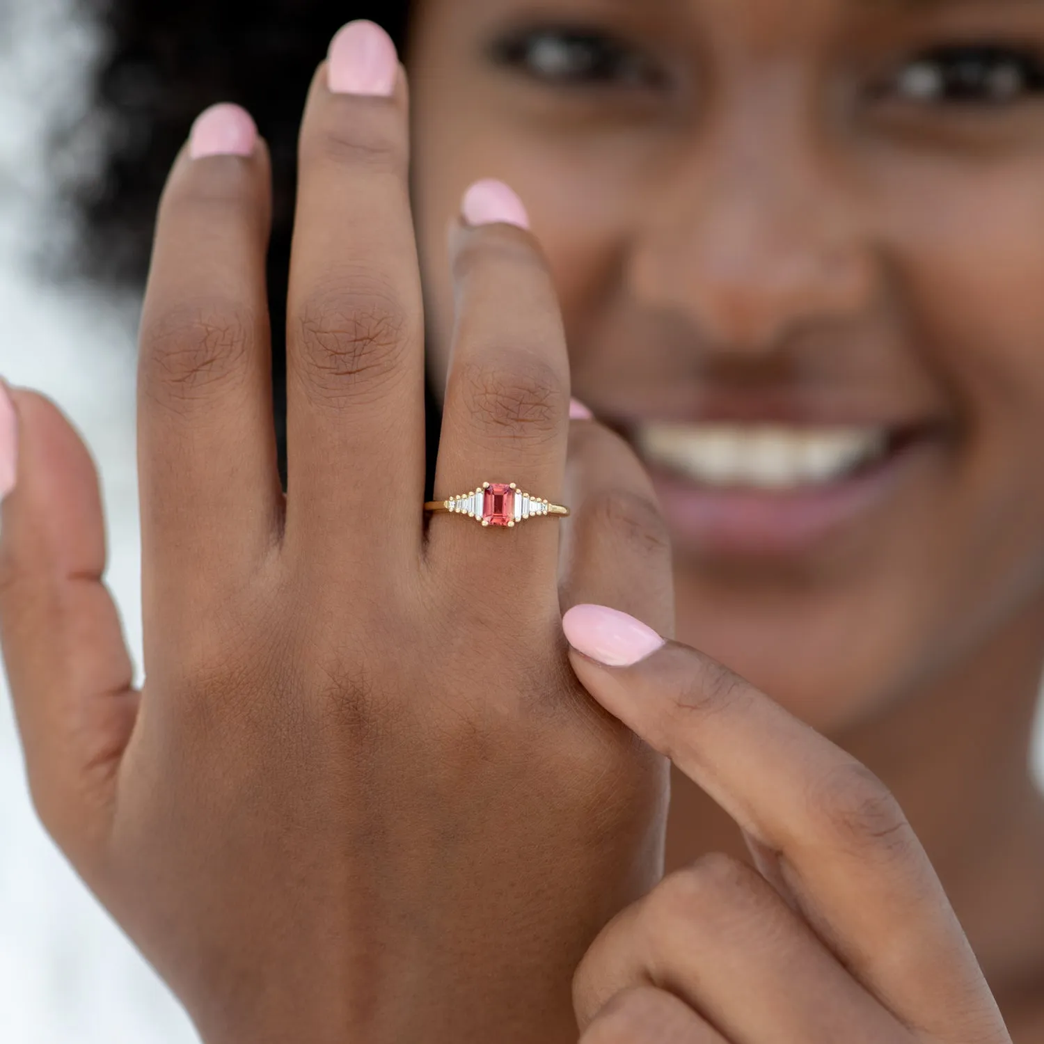 Padparadscha Sapphire Engagement Ring with Baguette Diamond Detailing