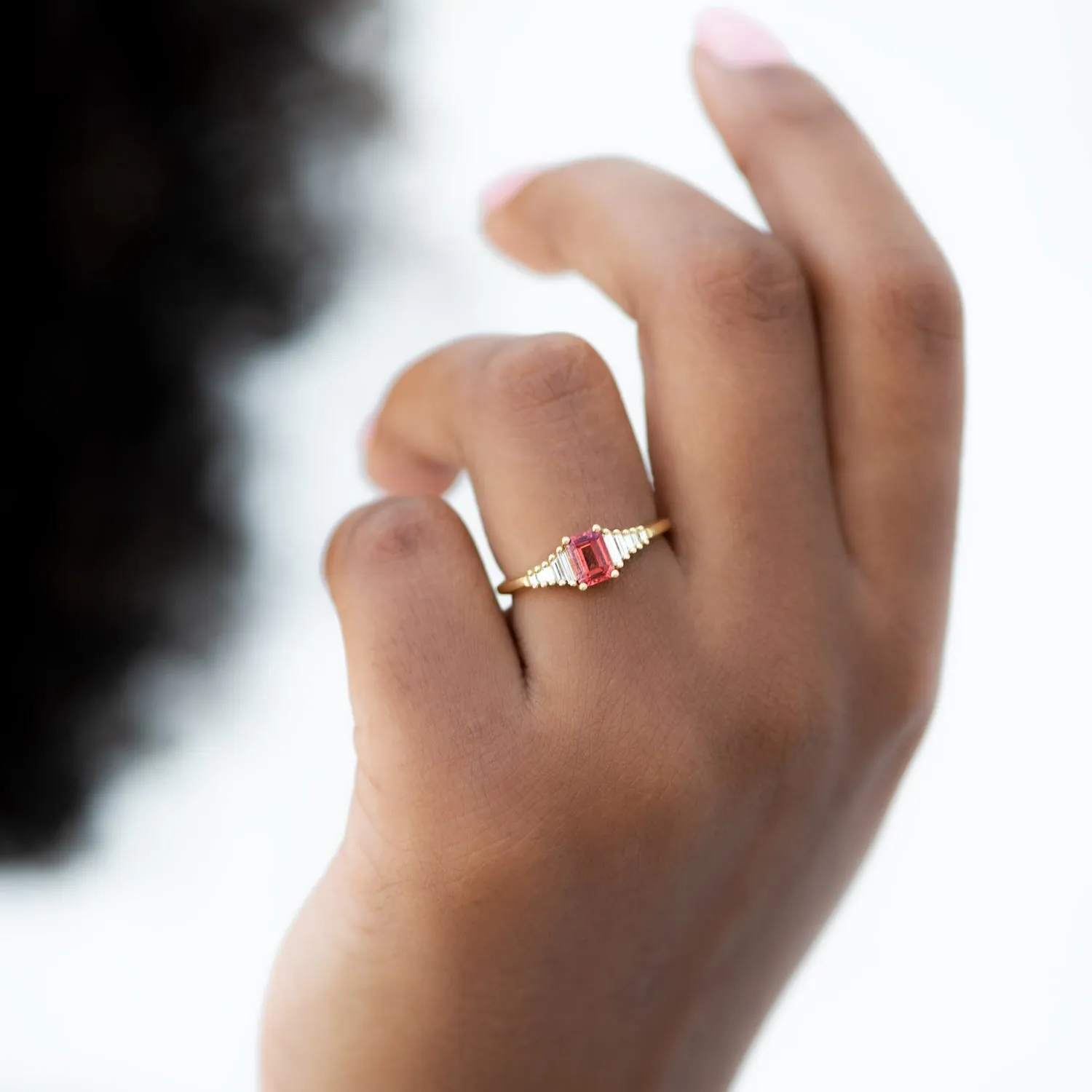 Padparadscha Sapphire Engagement Ring with Baguette Diamond Detailing